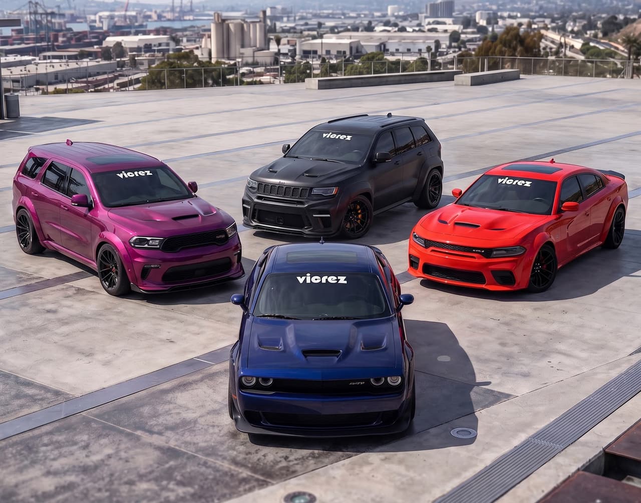 Four Vicrez-equipped vehicles — a Dodge Durango SRT, Jeep Grand Cherokee Trackhawk, widebody Dodge Charger, and Dodge Challenger — parked on a rooftop deck