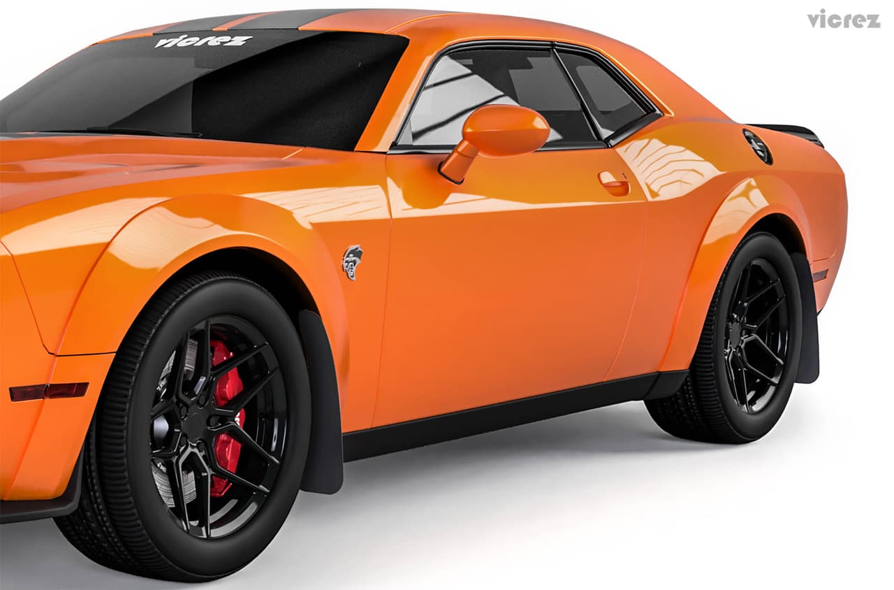 Orange Dodge Challenger with Vicrez front and rear mud flaps
